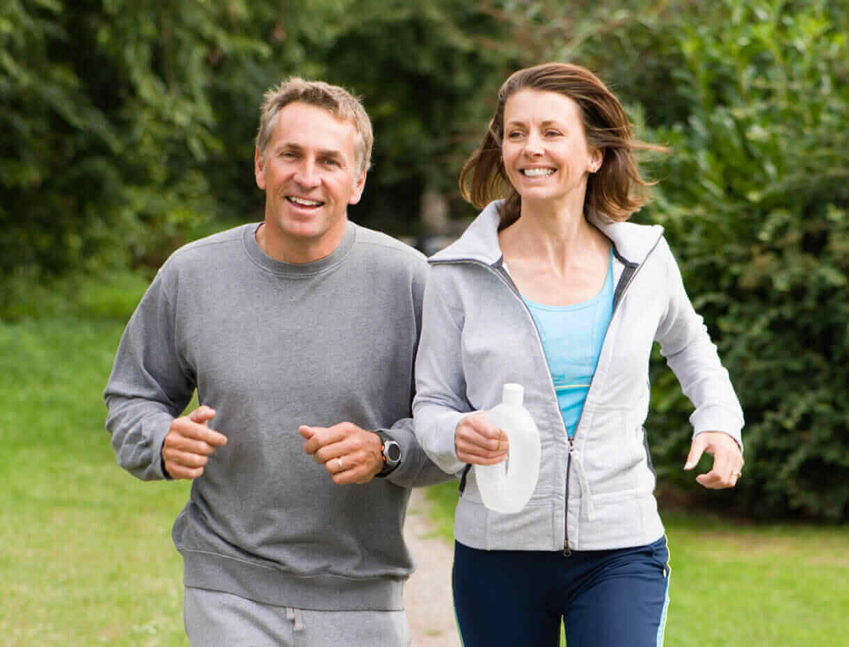 Couple Happily Jogging Together